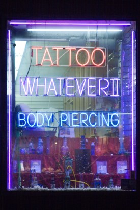 Licensing requirements are a government-created barrier to entry for new tattoo parlors.